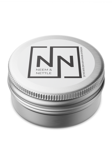 Neem and Nettle Hair Repair Salve Tin, on white background.