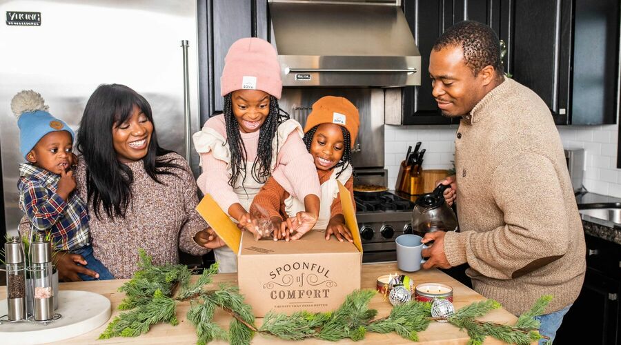 A family enjoying a Spoonful of Comfort holiday care package