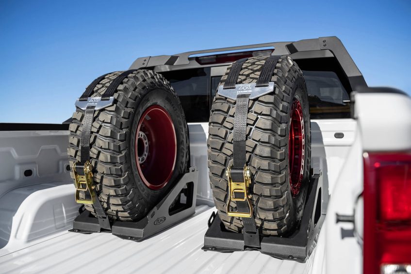 Spare tire holder for pickup trucks