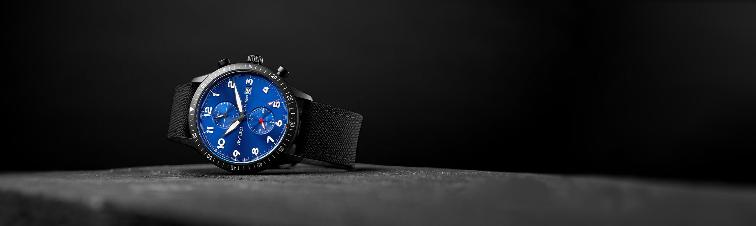 Black and blue watch in black background