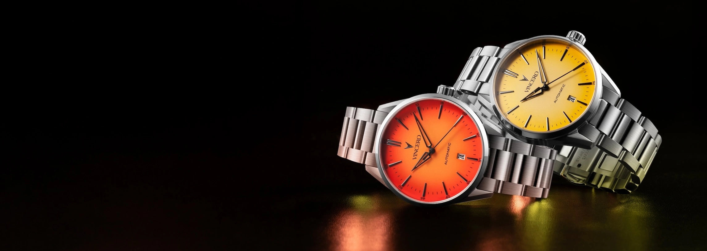 Five marble faced watches in black background