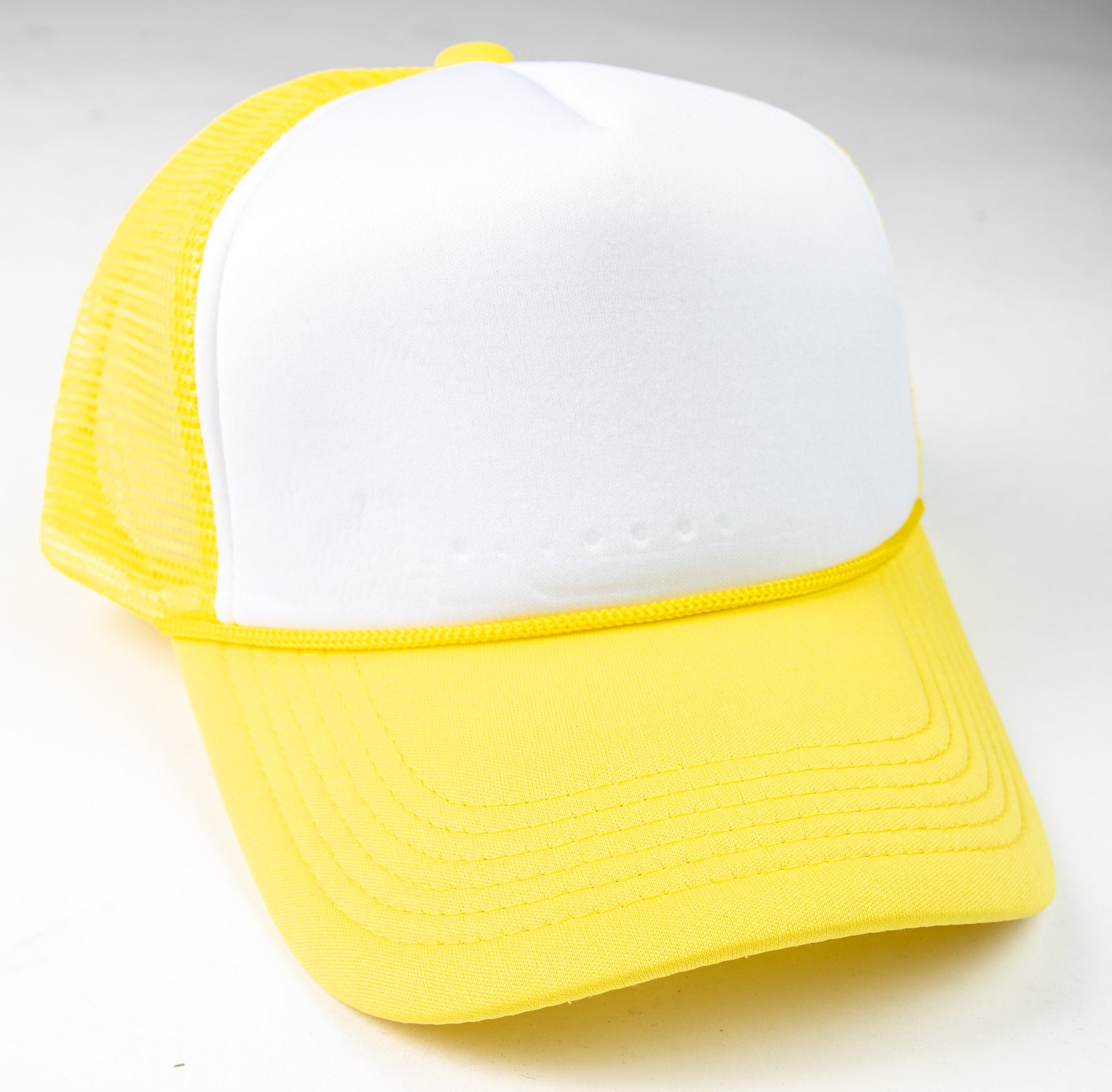 yellow white trucker hat