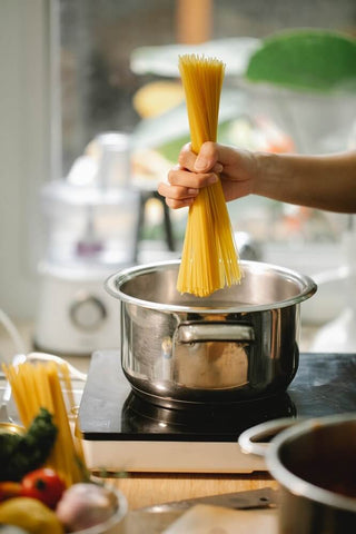 Bottom-clad stainless steel cookware can be identified through the sharp horizontal line across its base.