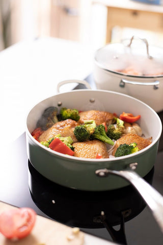 Ceramic cookware has excellent heat distribution for even cooking, perfect for dishes like veggies and poultry.