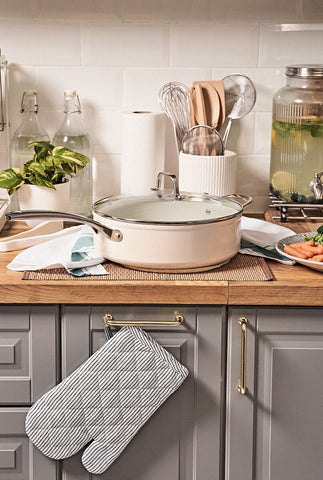 Ceramic coated Cosmo Pan in Cream fits beautifully in bright themed kitchens.