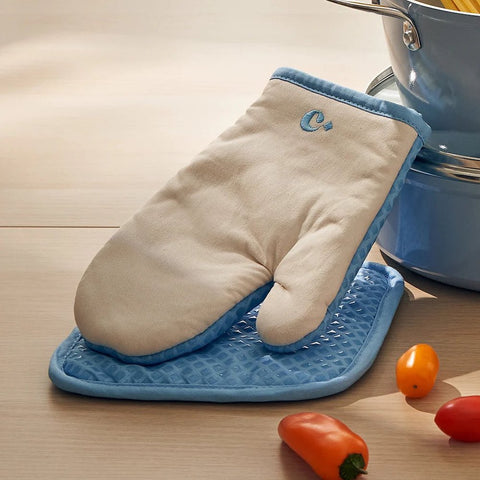 Oven mitts like the Cosmo Square Mitts make perfect eco-friendly home gifts.