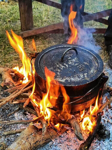 Dutch oven used in outdoor cooking. Photo by Sinethemba Gomba.