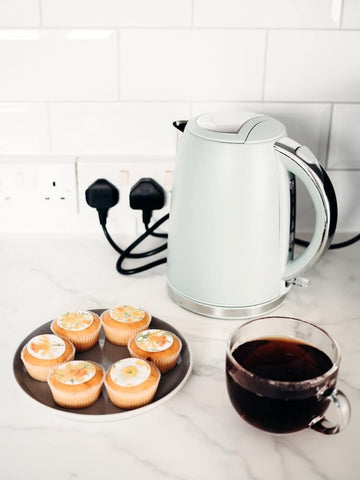 Electric kettle and hot coffee. Photo by Lisa Fotios.