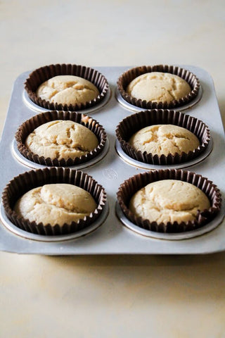 Muffin pan with freshly baked vanilla muffins. Photo by TSI.