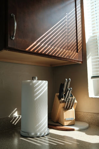 Paper towel for the kitchen with a set of knives. Photo by Brandon Cormier.