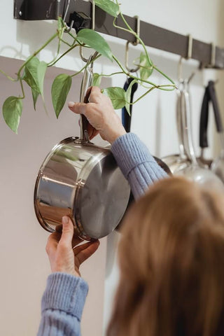 A single-ply stainless steel pan made from only one layer of stainless steel.