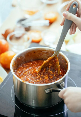 Stainless steel cooking on induction. Photo by Katerina Holmes.