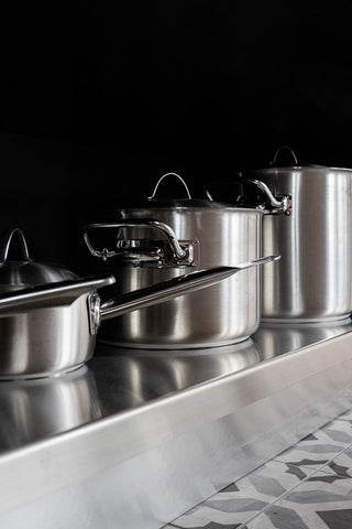 Nickel gives stainless steel cookware its shiny surface. Photo by Justus Menke on Unsplash.