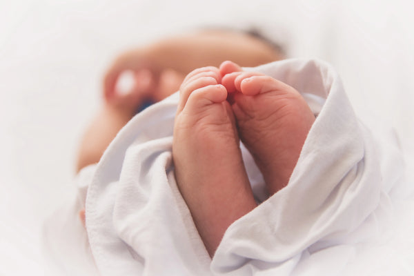 A baby having a good sleep in a room having IR heater