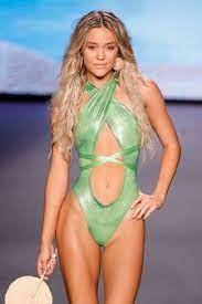 woman in green criss-cross halter bikini