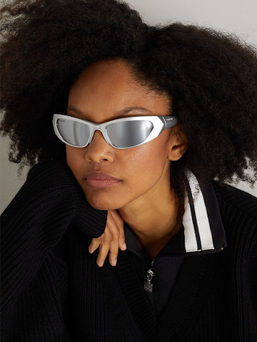 woman wearing silver sunglasses