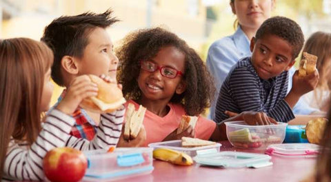 Children eating their litterless lunches