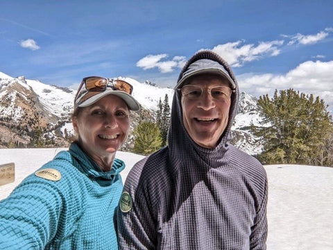 Woman and Man wearing Squak Mountain Co. Hoodies