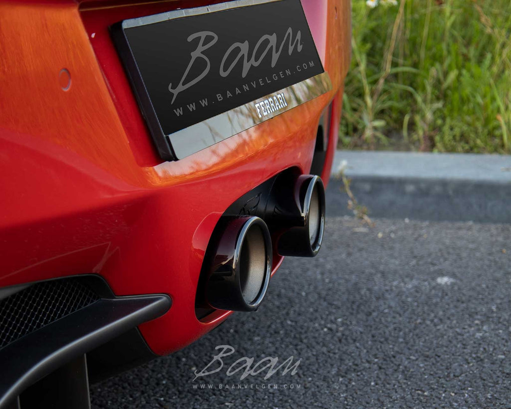 Ferrari 458 detailed shot of IPE black chrome tailpipes.