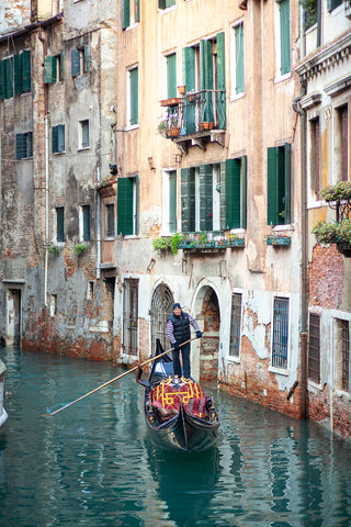 A gondola on the canals of Venice in Italy