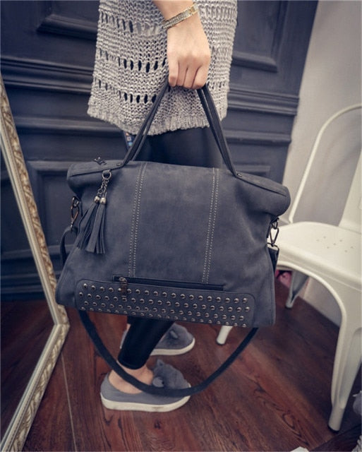 designer studded bolsa