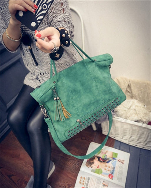 designer studded bolsa