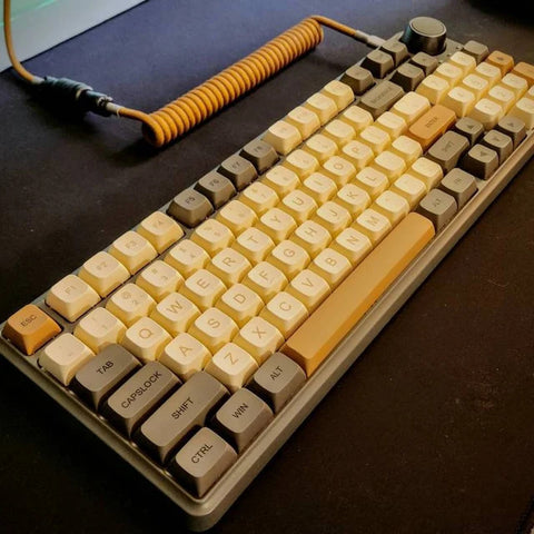 Golden coiled cable and keycaps