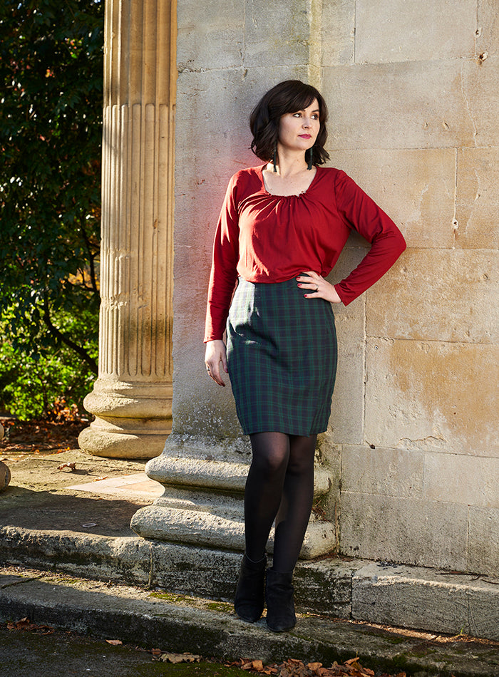 Lisa wearing the Ivy Skirt in a smart checked pattern