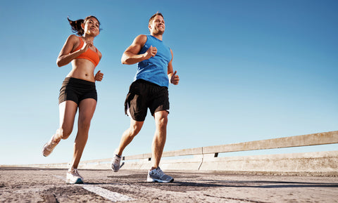 a man and a woman running