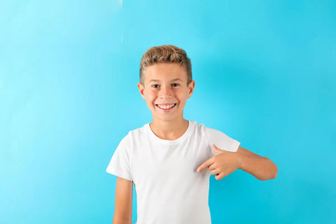 Kid wearing a white tee