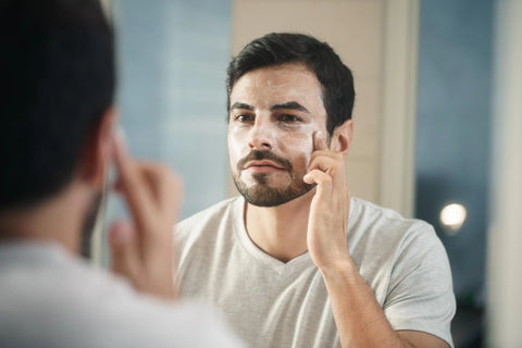 Man looking in the mirror