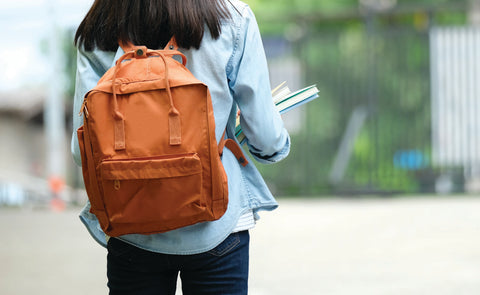 Woman wearing a backpack