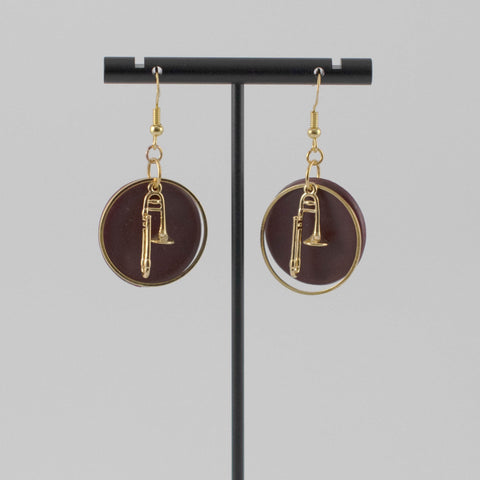 Gold trombone earrings with maroon backing