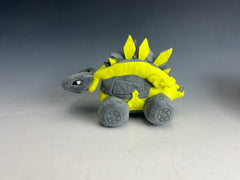gronk skidloader stegosaurus toy