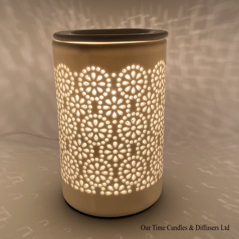 Electric wax burner with cut out design