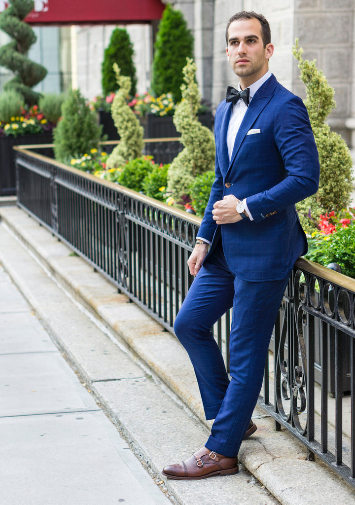 all black suit and bow tie