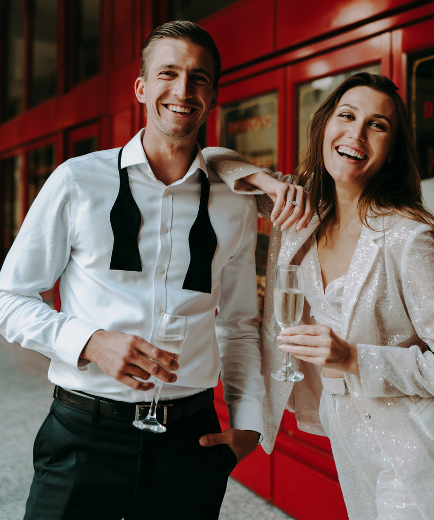 Cocktail party with man wearing white shirt