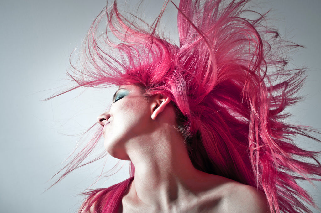 Woman with magenta hair, symbolizing power and love