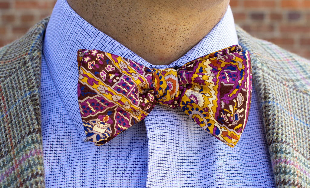 Purple Paisley Bow Tie with a pop of peach color