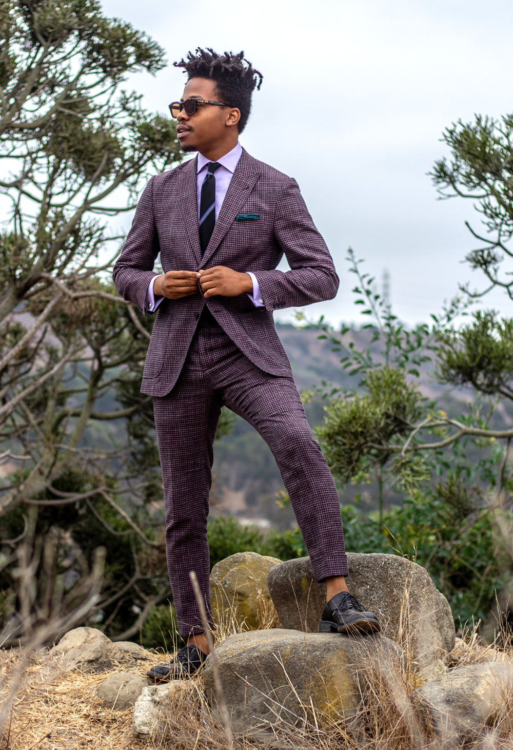 Man looking styling in a modern, colorful tweed suit