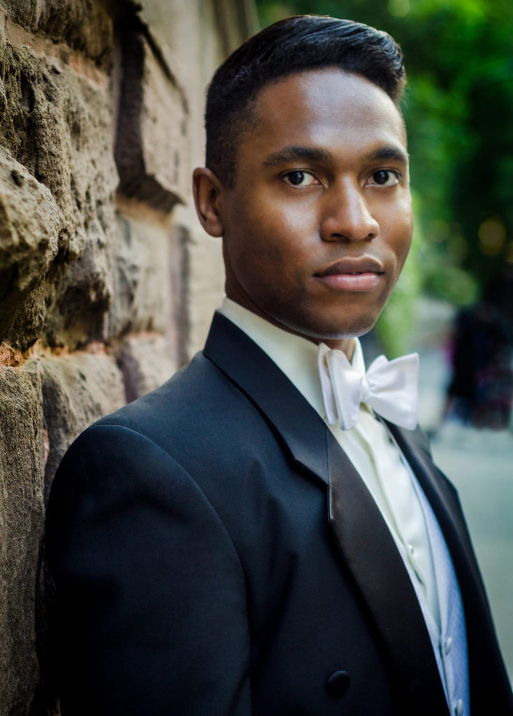 Young Man Wearing White Tie Attire