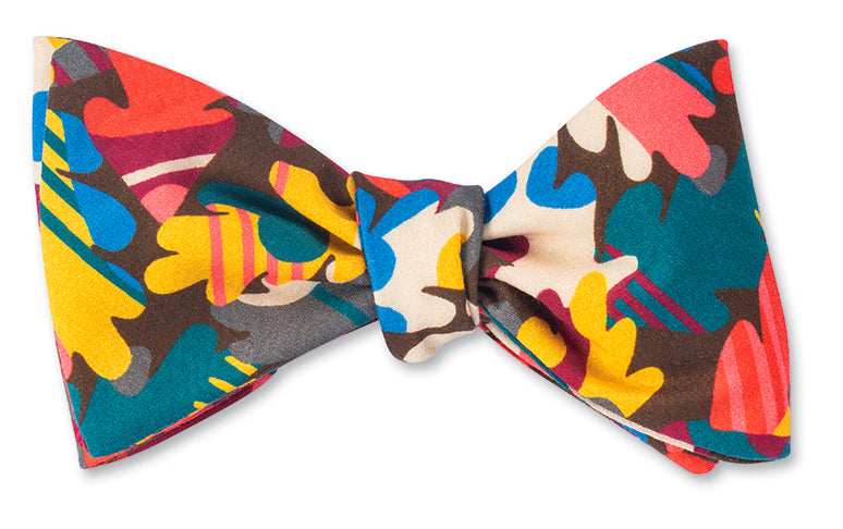 Bow Tie with subtle pops of magenta and complimenting colors