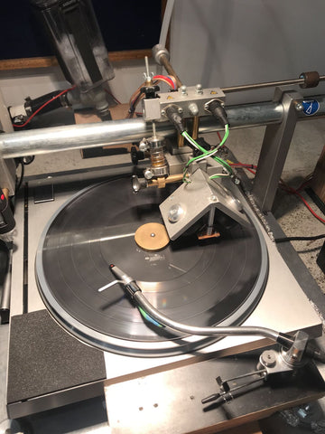 12 inch vinyl record being cut on a vinyl cutting lathe