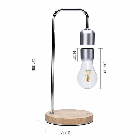 Visar skrivbordslampan med trådlös laddning samt mått för storleken på lampan, basen och lampan