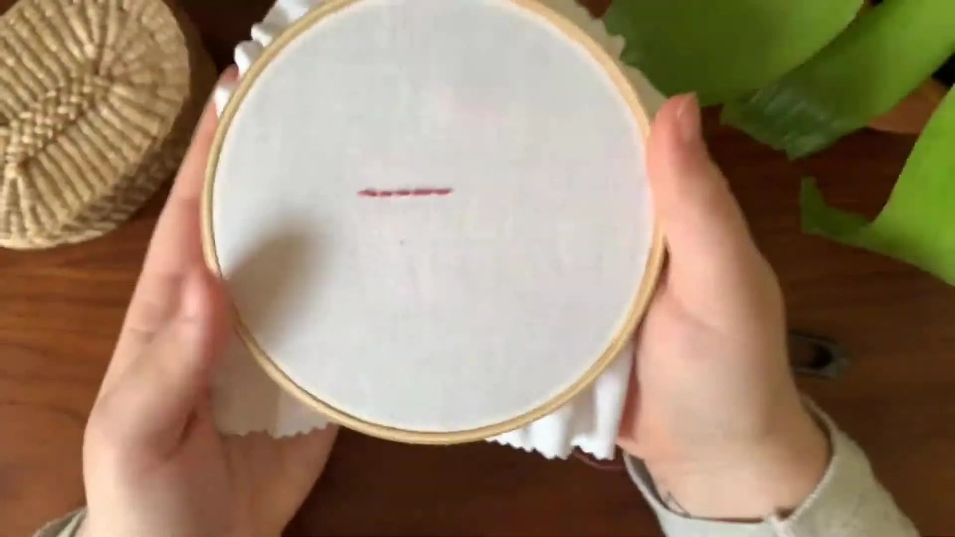 Overhead view of the completed backstitches on the front of the fabric.