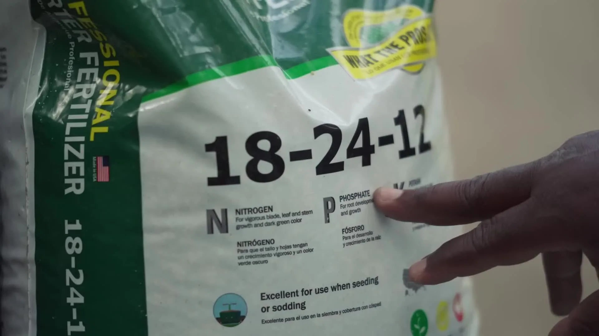Close-up of a starter fertilizer bag showing the '18-24-12' NPK ratio.