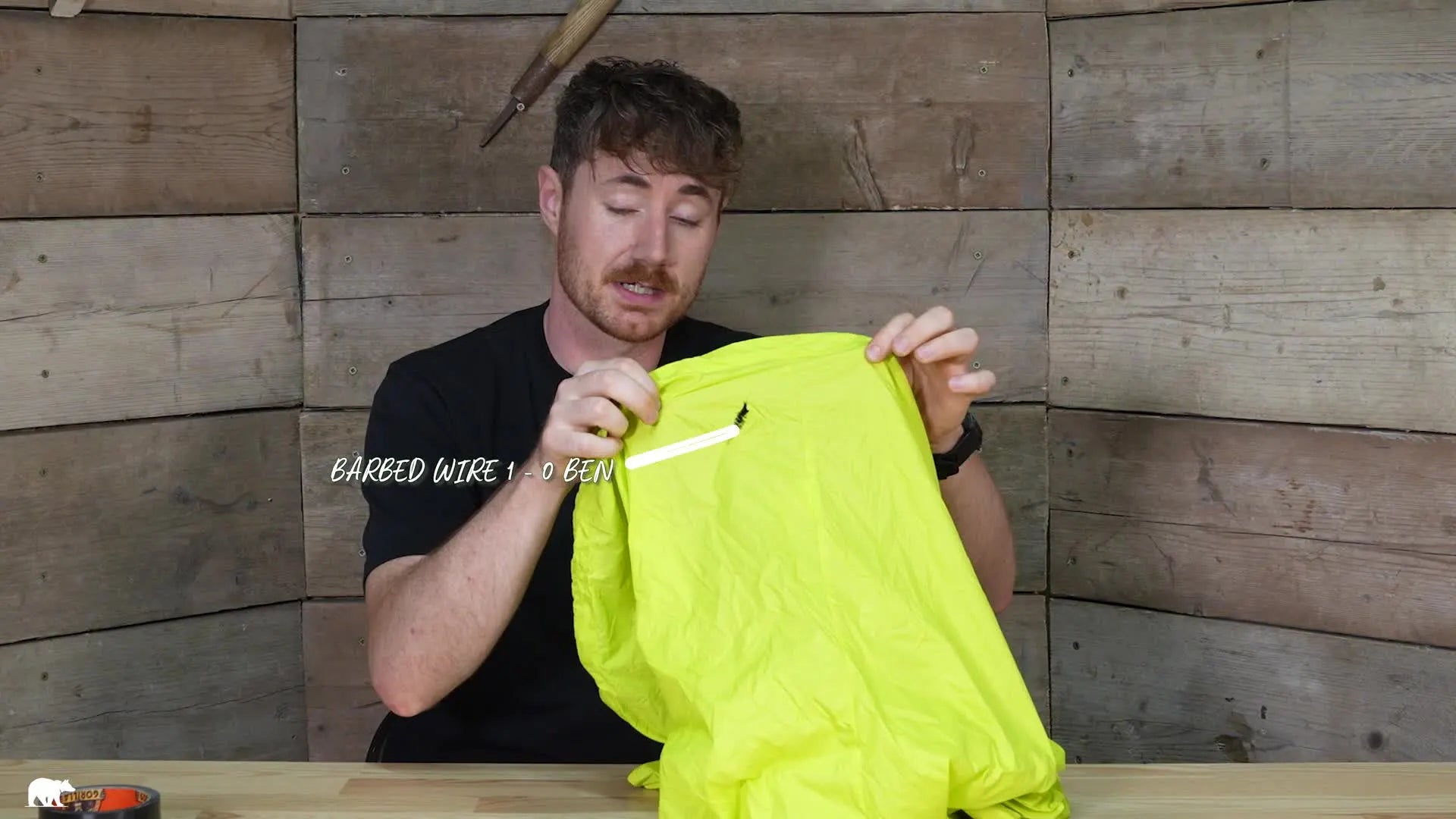 Close up of a tear in a yellow windshell.