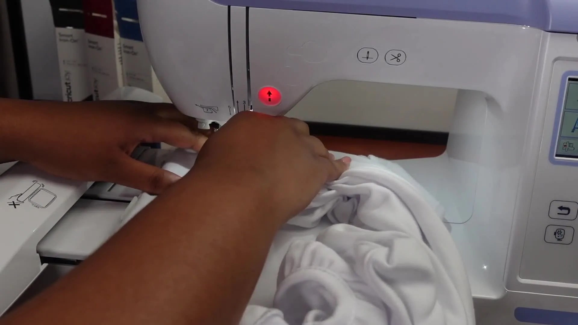 Magnetic hoop being inserted into the Brother PE800.