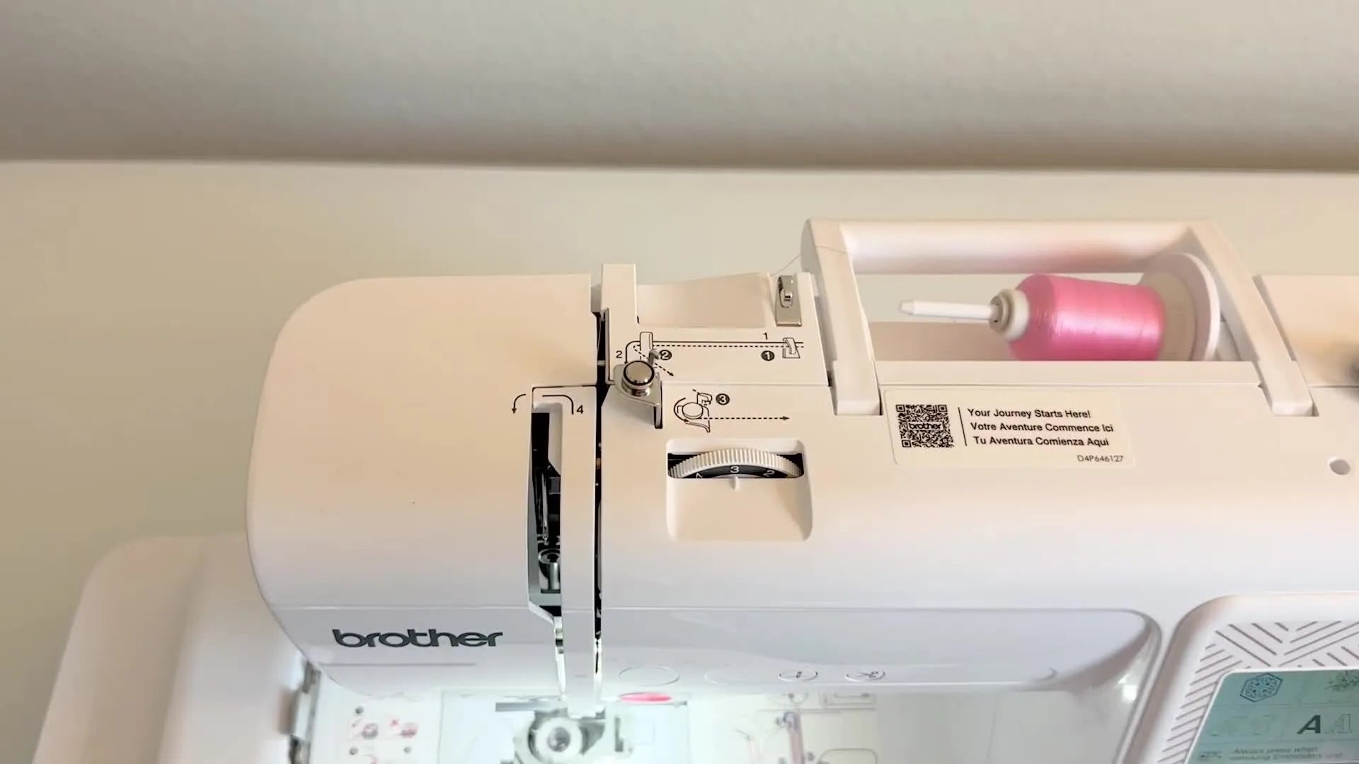 Overview of the tension dial and thread path on the Brother PE570.