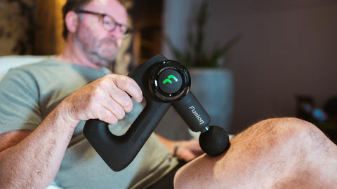 massage your legs with massage gun deep tissue